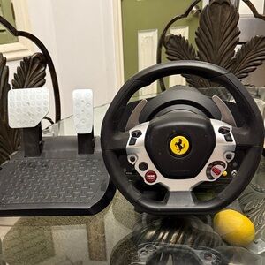 Ferrari Black and Silver Steering Wheel with Pedals